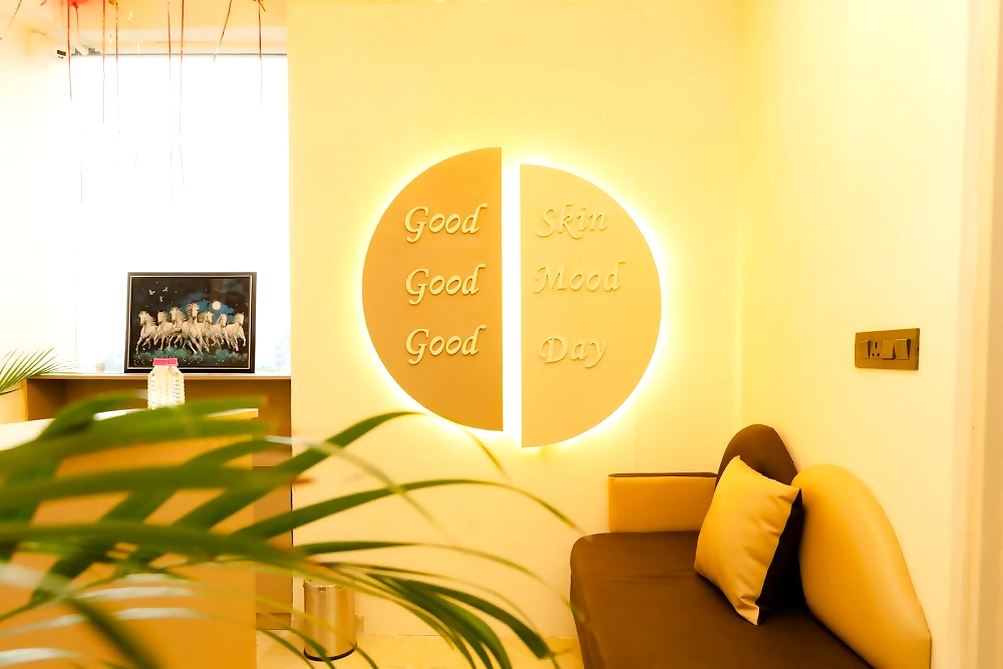 Waiting lounge with Good Skin Good Mood Good Day sign