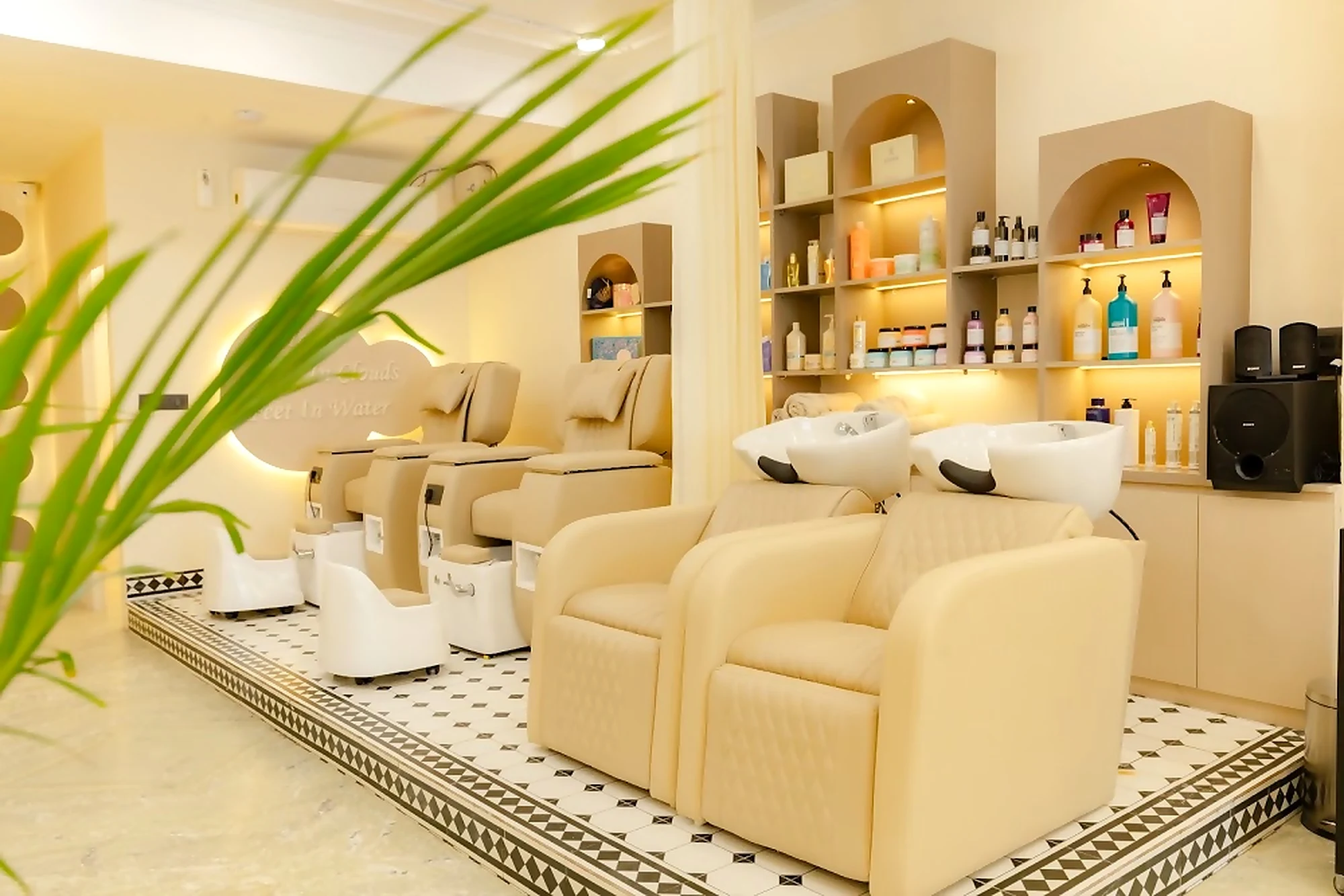 Wash lounge with warm backlit product niches